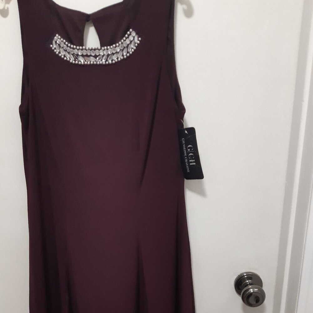 Dressy beautiful Purple Sleeveless lined Dress with accented neck Size 9